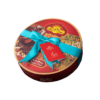 Round box of Sohan Gol Saediniya sugar-free sweets, wrapped with a turquoise ribbon and a red tag